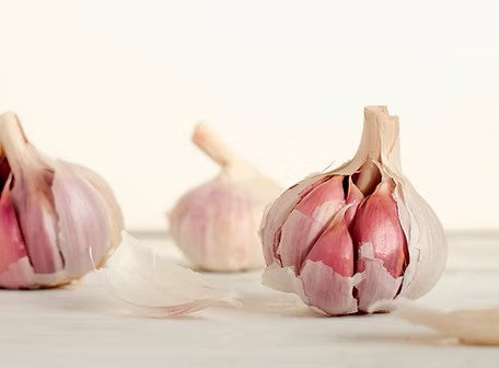 Garlic cloves that have turned green — safe to eat